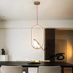 Lámparas colgantes contemporáneas Aurea con LED integrado instaladas en comedor