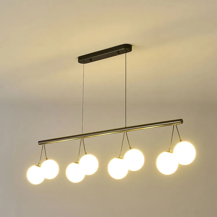 Lámparas colgantes Skandi de cristal y metal negro mate con 8 puntos de luz encendidas
